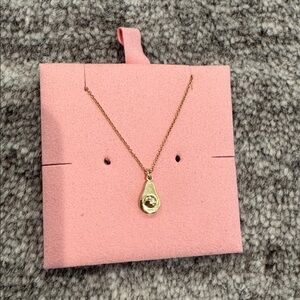 Jessica Winzelberg 14k gold necklace with Avocado pendant